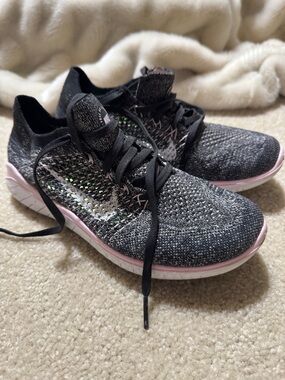 Nike Women’s Black Knit Running Shoes with Pink Accents